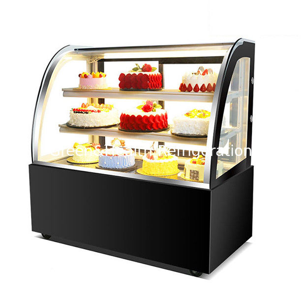 Congelador de exhibición de pasteles de acero inoxidable con vidrio curvo y múltiples estantes para uso comercial