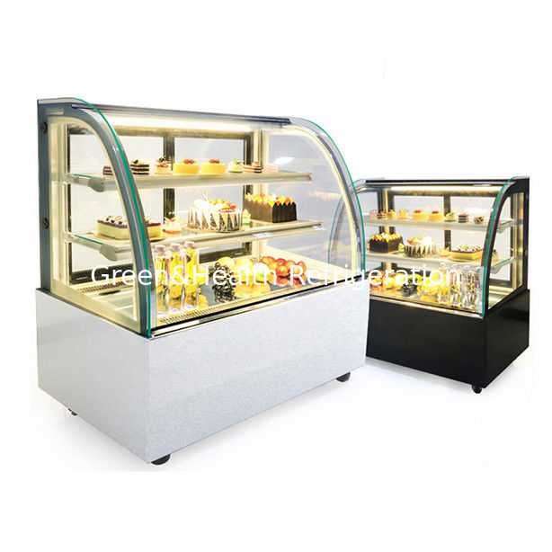 Congelador de exhibición de pasteles de acero inoxidable con vidrio curvo y múltiples estantes para uso comercial