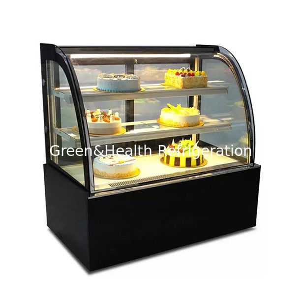 Congelador de exhibición de pasteles de acero inoxidable con vidrio curvo y múltiples estantes para uso comercial